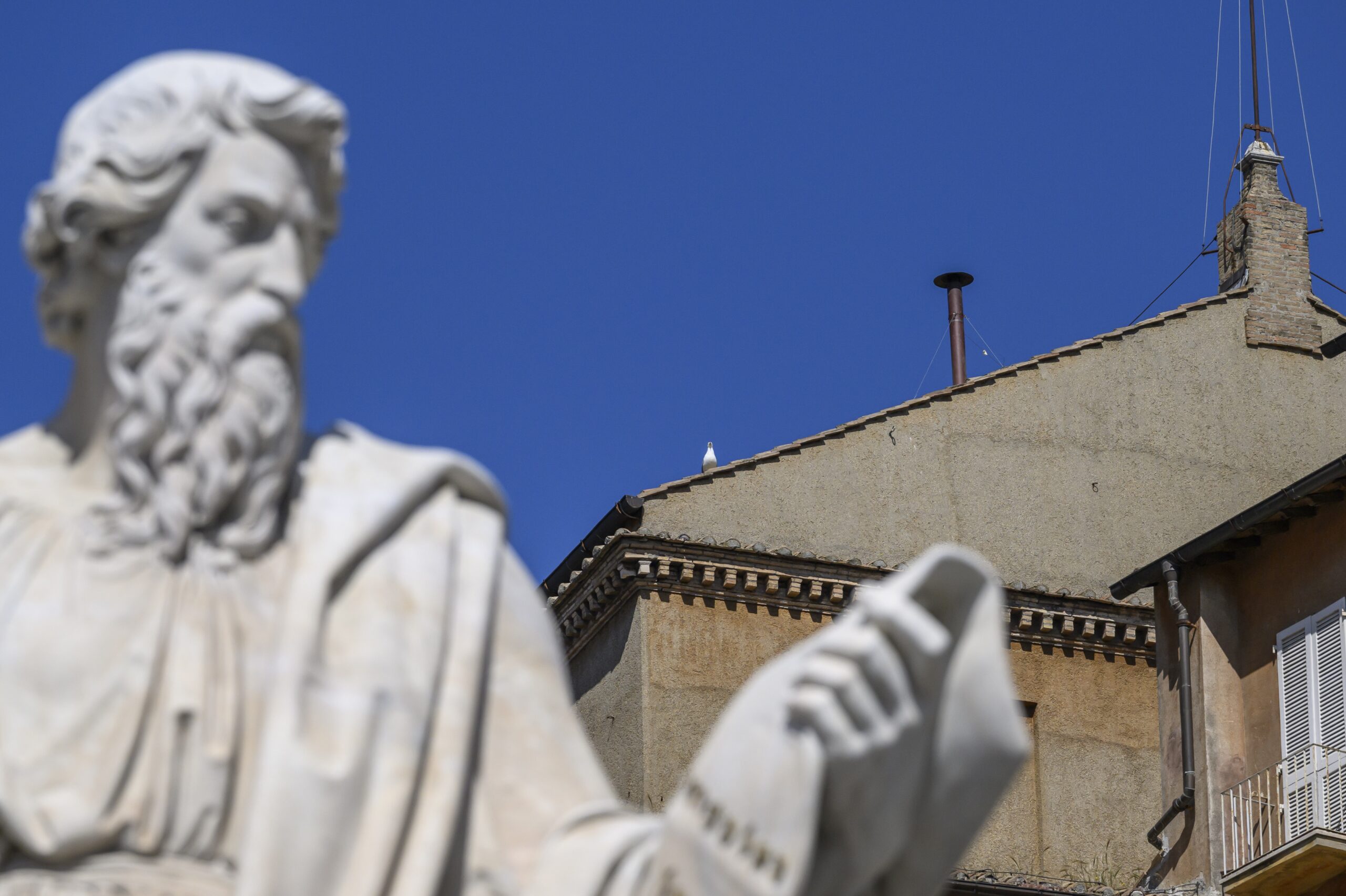 Black smoke rises from the Sistine Chapel as cardinals cast an unsuccessful first vote
