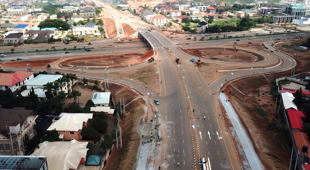 Tinubu Sings ‘E Dey Pain Dem’ During Road Commissioning In Abuja
